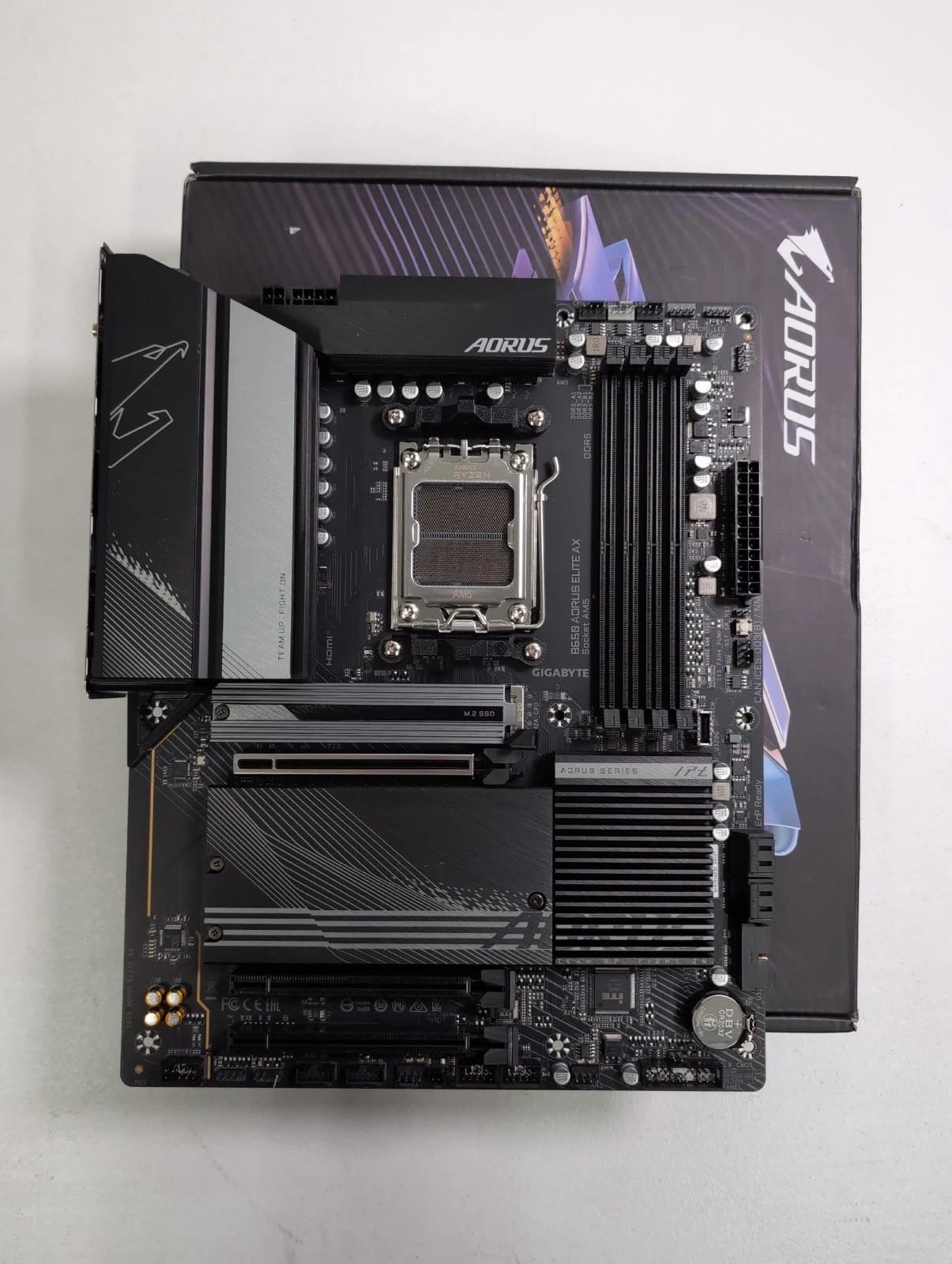 GIGABYTE B650 AORUS Elite AX AMD AM5 ATX Motherboard, Support Ryzen 9000/8000/7000 Series, DDR5, 14+2+1 Power Phase, PCIe 5.0 M.2, USB-C 3.2 Gen 2, WIFI6E, 2.5GbE, EZ-Latch, Q-Flash, RGB Fusion customer photo 1