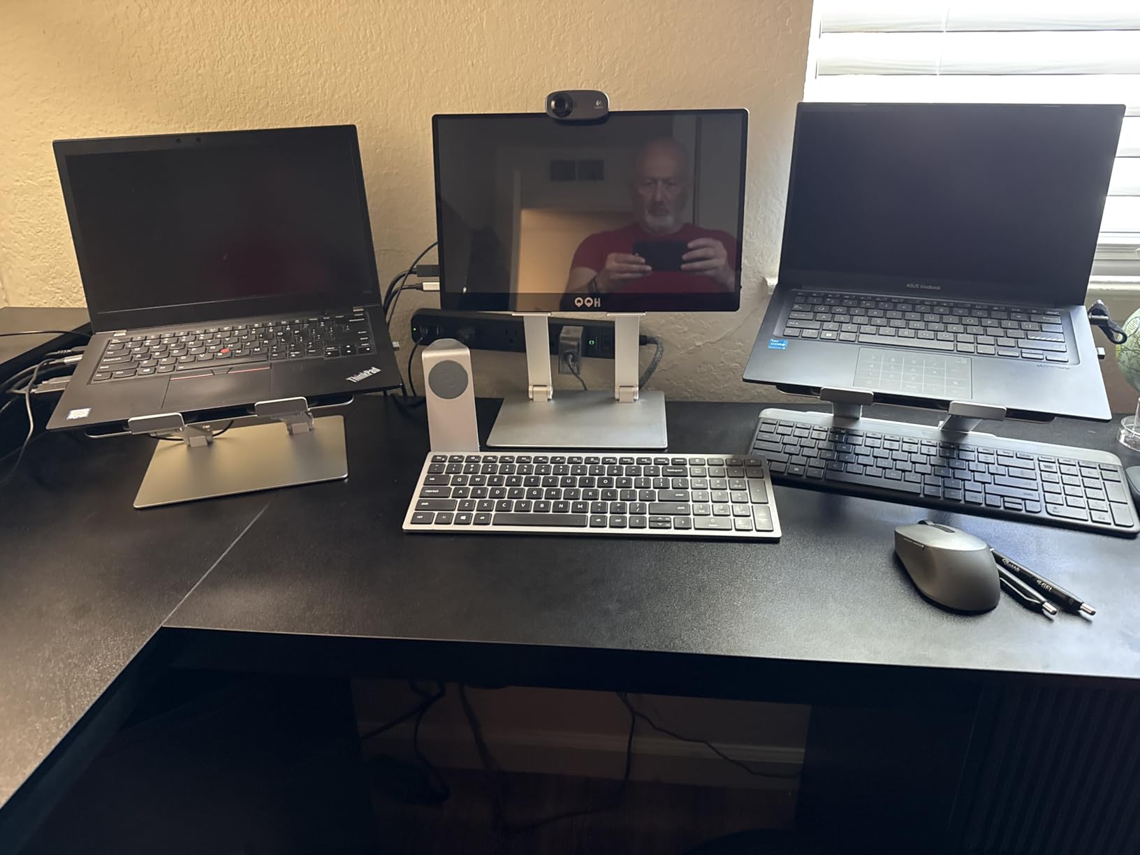 Amazon Basics Sturdy and Portable Ergonomic Laptop Stand for Desk, Height Adjustable Riser with Ventilated Cooling, Foldable, Fits all Laptops up to 15.6 Inch, Silver customer photo 2