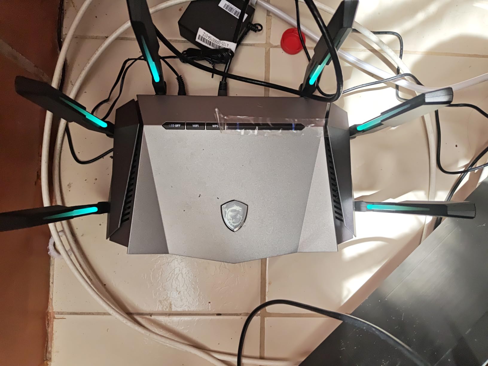 MSI Radix AXE6600 WiFi 6E Tri-Band Gaming Router, AI QoS, RGB, 1.8GHz Quad-Core Processor, MU-MIMO, Tri Band Gigabit Wireless, 8-Stream, High Speed Long Range Gaming Router customer photo 1