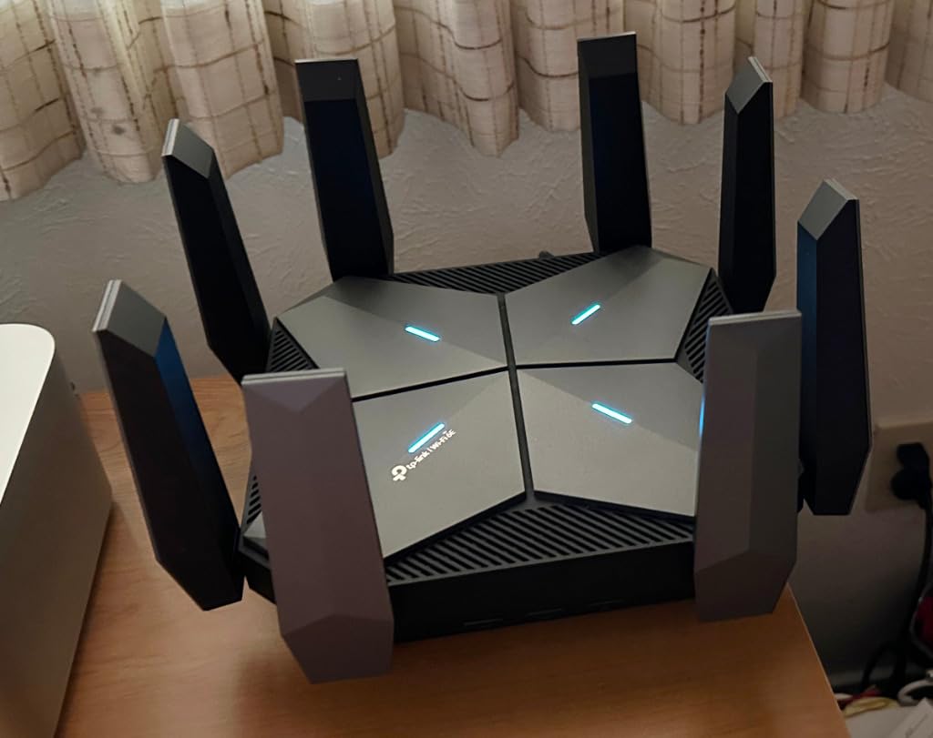 TP-Link Tri-Band AXE5400 Wi-Fi 6E Gaming Router 6-Stream, Archer GXE75 | 5.4 Gbps, 1x2.5G + 4x1G Ports, USB 3.0, Exclusive Acceleration, Gaming Port & Panel, RGB Lighting, EasyMesh, HomeShield customer photo 1