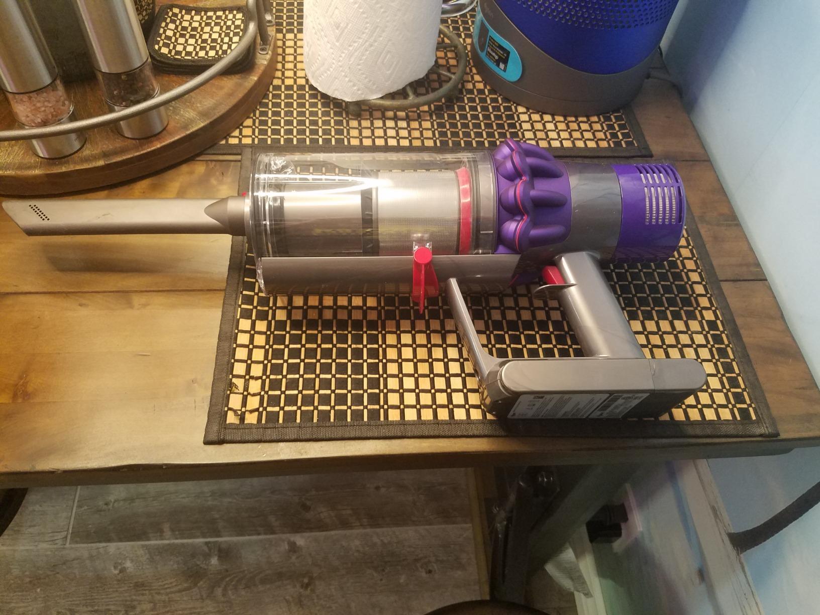 Dyson V10 Cordless Stick Vacuum Cleaner: 14 Cyclones, Fade-Free Power, Whole Machine Filtration, Hygienic Bin Emptying, Wall Mounted, Up to 60 Min Runtime, Purple customer photo 2