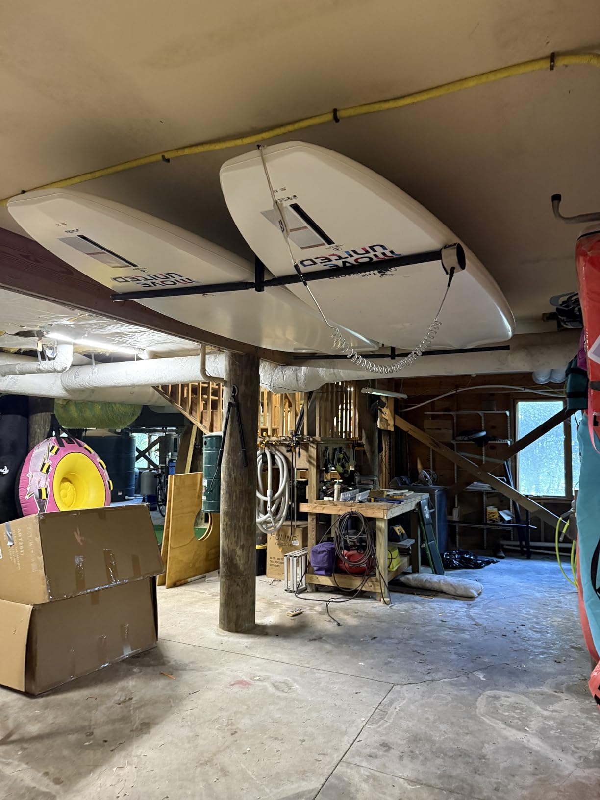 StoreYourBoard Standup Paddle Board and Surfboard Garage Storage Rack - Adjustable Ceiling Mount Hanger for SUP Storage, Heavy Duty Overhead Paddleboard Organizer for Garage, Space Saving Rack customer photo 1