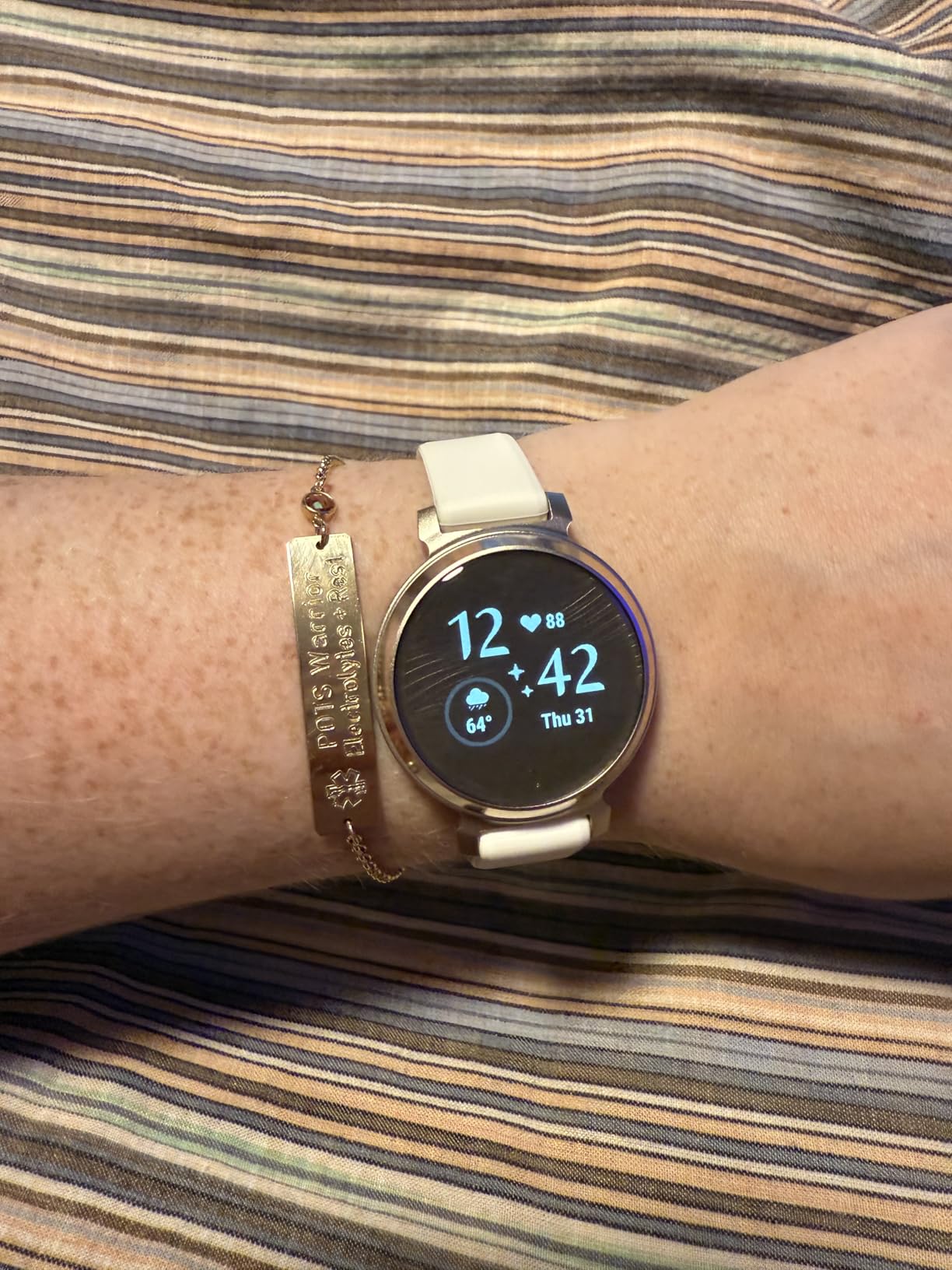 Garmin Lily® 2, Small & Stylish Smartwatch, 35mm, Coconut customer photo 1
