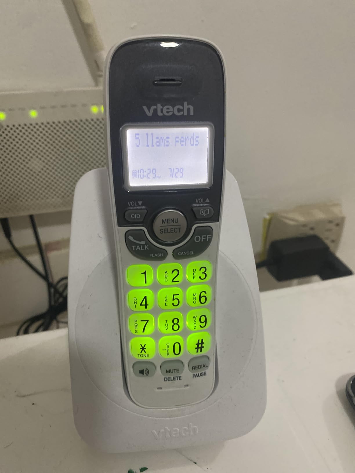 VTech Cordless Phone with DECT 6.0, Full-Duplex Speakerphone, Lighted Display, Backlit Keypad, Caller ID/Call Waiting, Volume Control, Hearing Aid Compatible, Wall Mount | VG131-11 (Black) customer photo 1