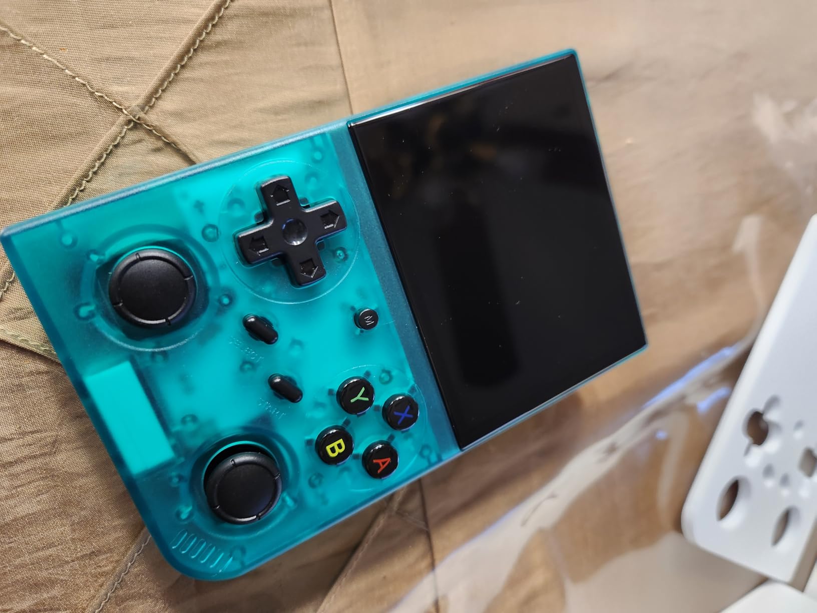 GiipGoop RG35XX Pro Handheld Game Consoles RG35XXPro Retro Gaming Console with 64GB Card 4353 Games Video Game Console Pocket Arcade Support 30+ Simulators WiFi Bluetooth HD Output Transparent Teal customer photo 2